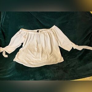 White blouse with bows on sleeves